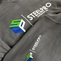 Stack of professionally printed documents showcasing high-volume printing capabilities